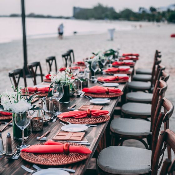Long table set for a seaside dinner