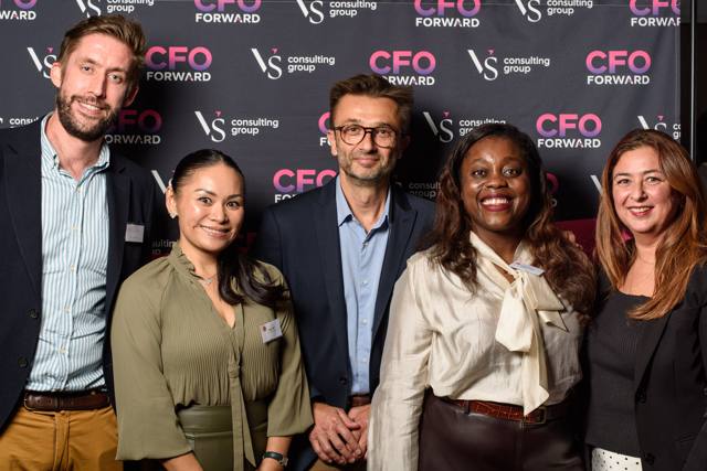 Group photo in front of the CFO Forward wall
