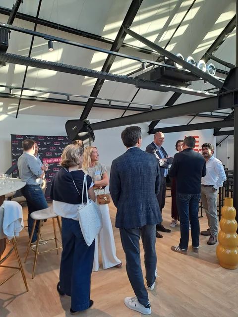 Guests gathered under the Triplex roof beams during the reception